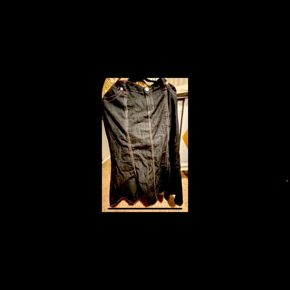 Long denim fit and flare skirt. Size 16. Two pockets on the back.